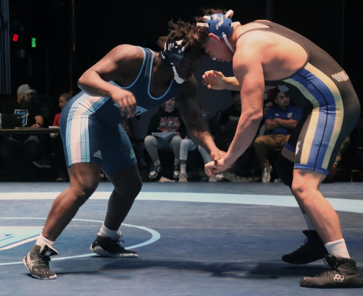 Jonathan Harris in the 190lb weight class pushes against his opponent Jonathan Dominguez.