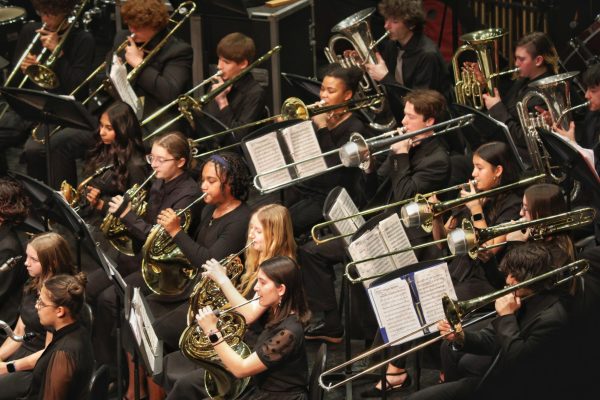 The Downers Grove South music department combines its bands and orchestras for a winter concert.