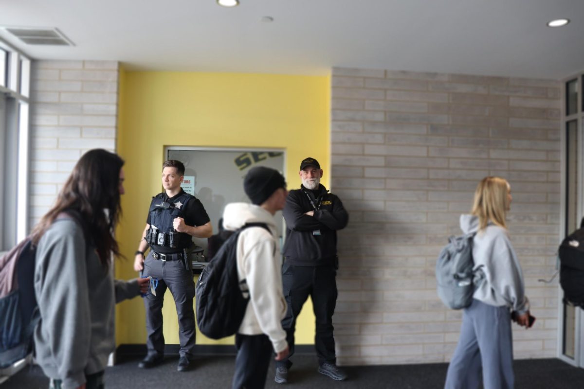 Security manages and controls situations with students to make sure everyone is safe and there are no conflicts. 