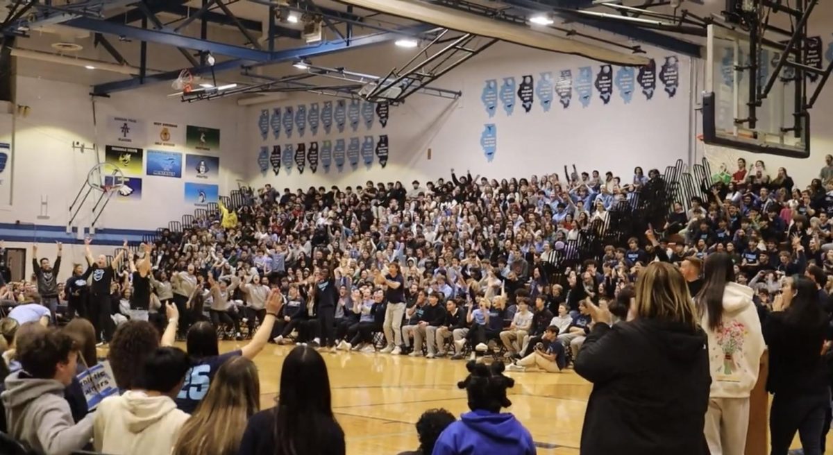 Students gather in the Large Gym to cheer on their respective class at the pep assembly.