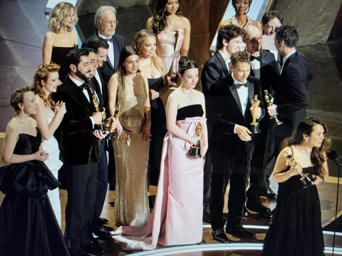 97th Oscar Nominees Pose with Awards.