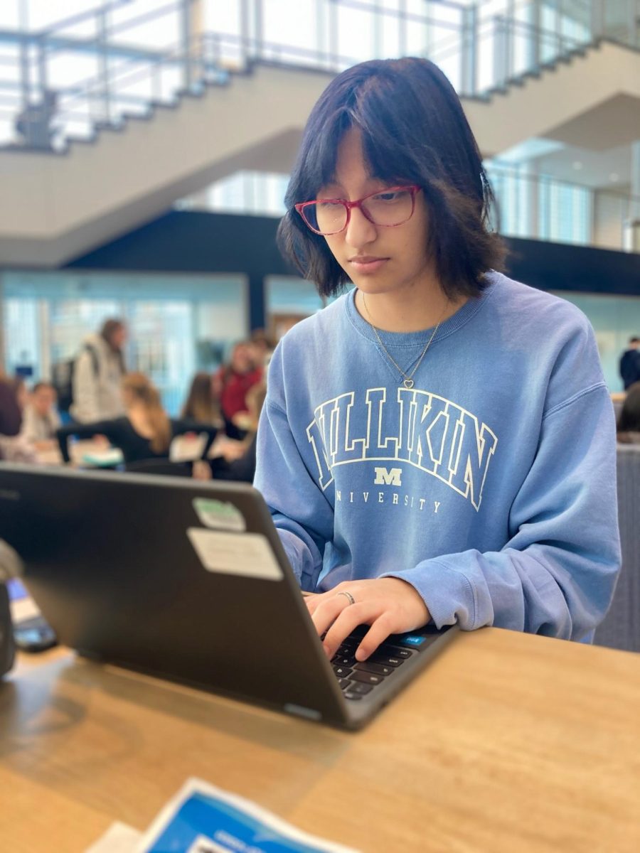 Junior Sofia Sanchez works on her homework assignments during the school day.