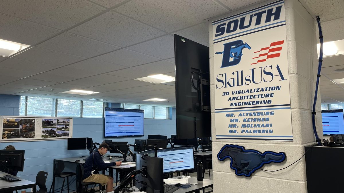 CTE teacher and SkillsUSA adviser Mark Molinari's classroom is decorated with countless posters, plaques and frames paying homage to the success of his students over the years.