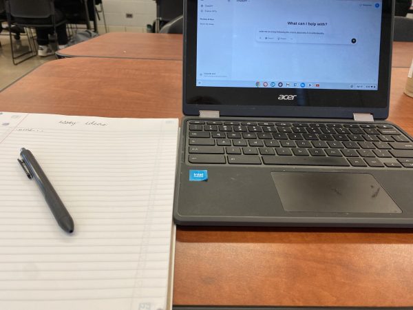 A high school student can't think of any ideas for an essay, and resorts to the solution of utilizing AI.