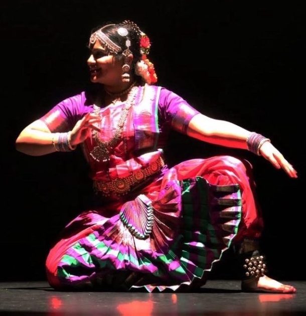 Abraham illustrates a story through her Bollywood routine at a dance competition.