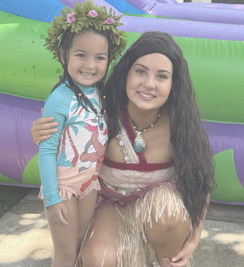 Foresman makes a young child's day, dressing up as princess Moana for an event.
