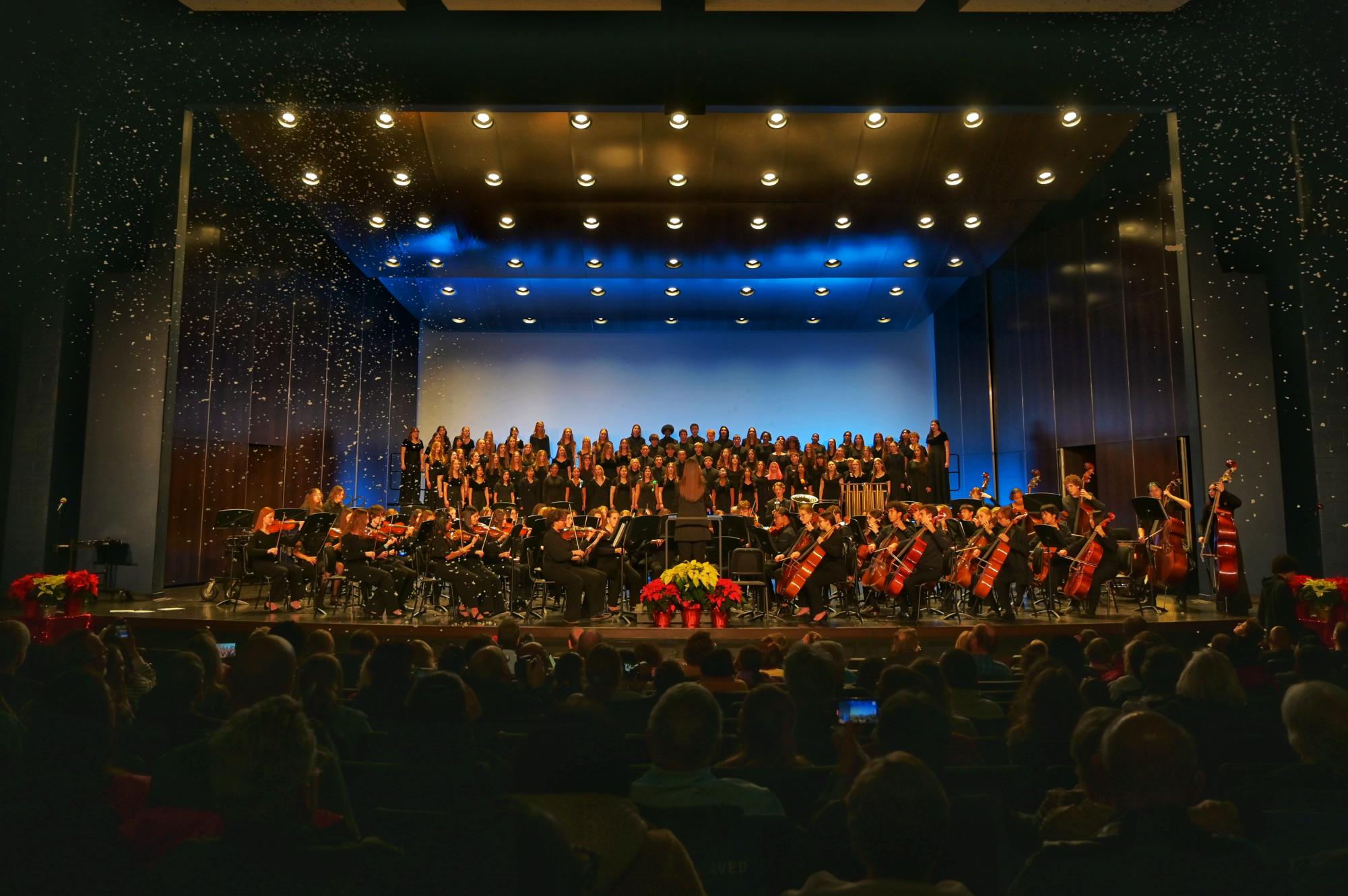Combined Orchestras and Choirs close out the 2025 'Dimensions' concert with a large ensemble performance.