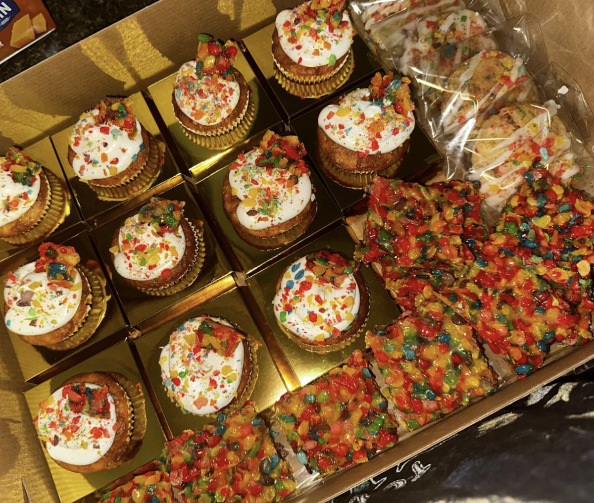 Ezell creates and packages an assortment of Fruity Pebbles desserts for her clients.