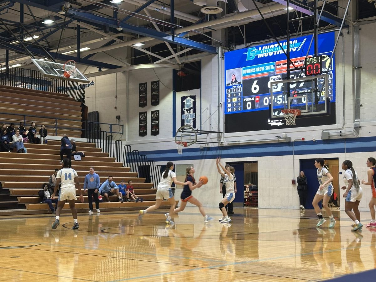 Freshman Molly Mihalik defendd Naperville North guard to help force a turnover for the Mustangs to retain the ball back in the fourth quarter.