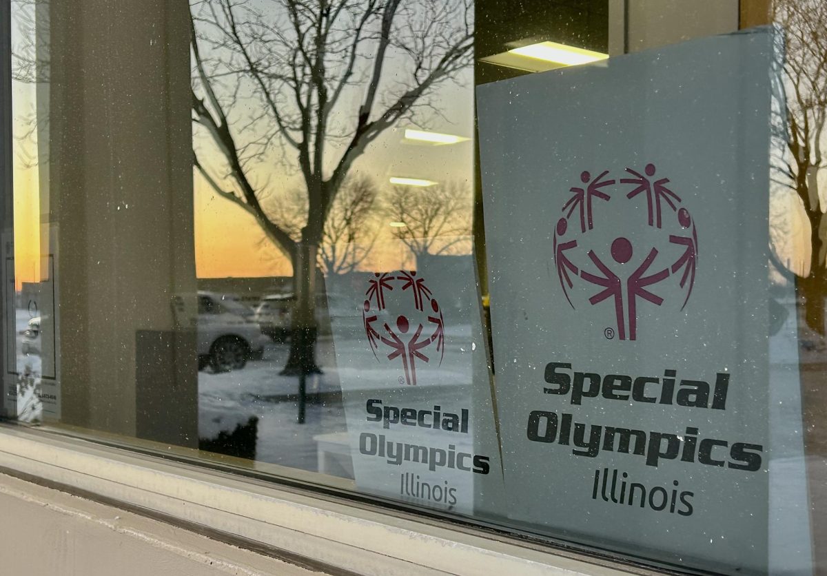 Posters fill windows at Special Olympics Illinois building in Lombard.