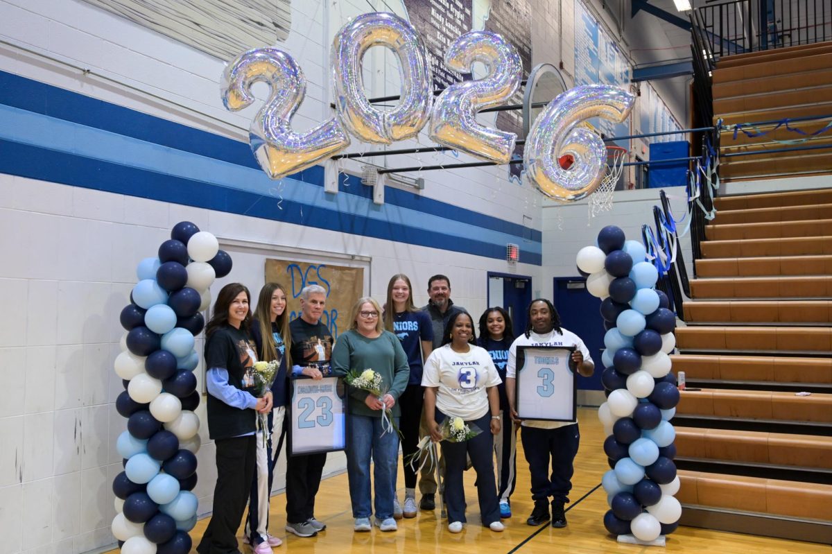 Before a high-tension game against Morton, the Girls Basketball team recognizes their 3 senior players, #3 Jakylah Thomas, #20 Megan Ganschow and #23 Mila Kosanovic-Cruise.