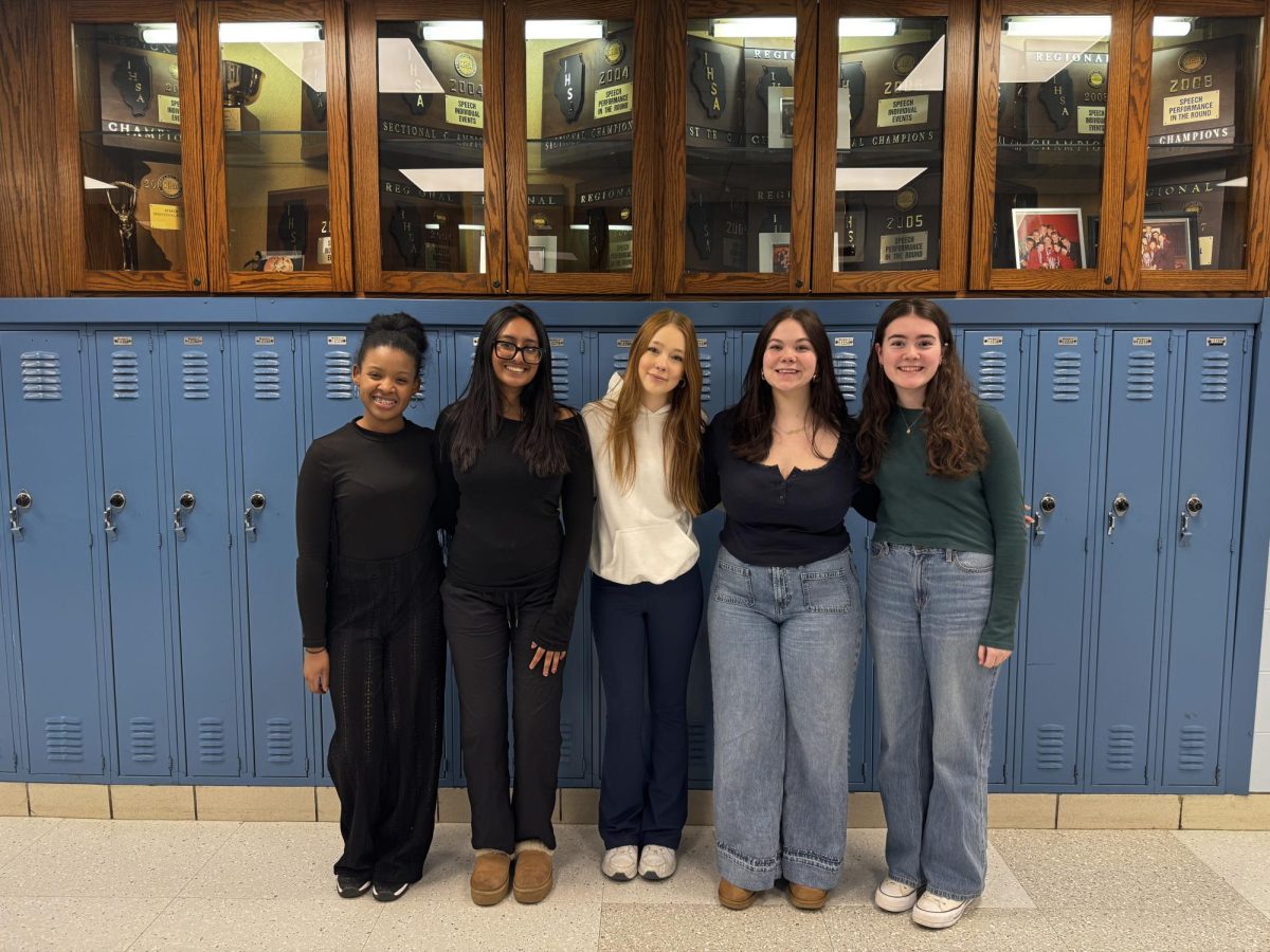 The 'The Revlon Girl' play cast stands together, showing solidarity throughout the tight-knit group.