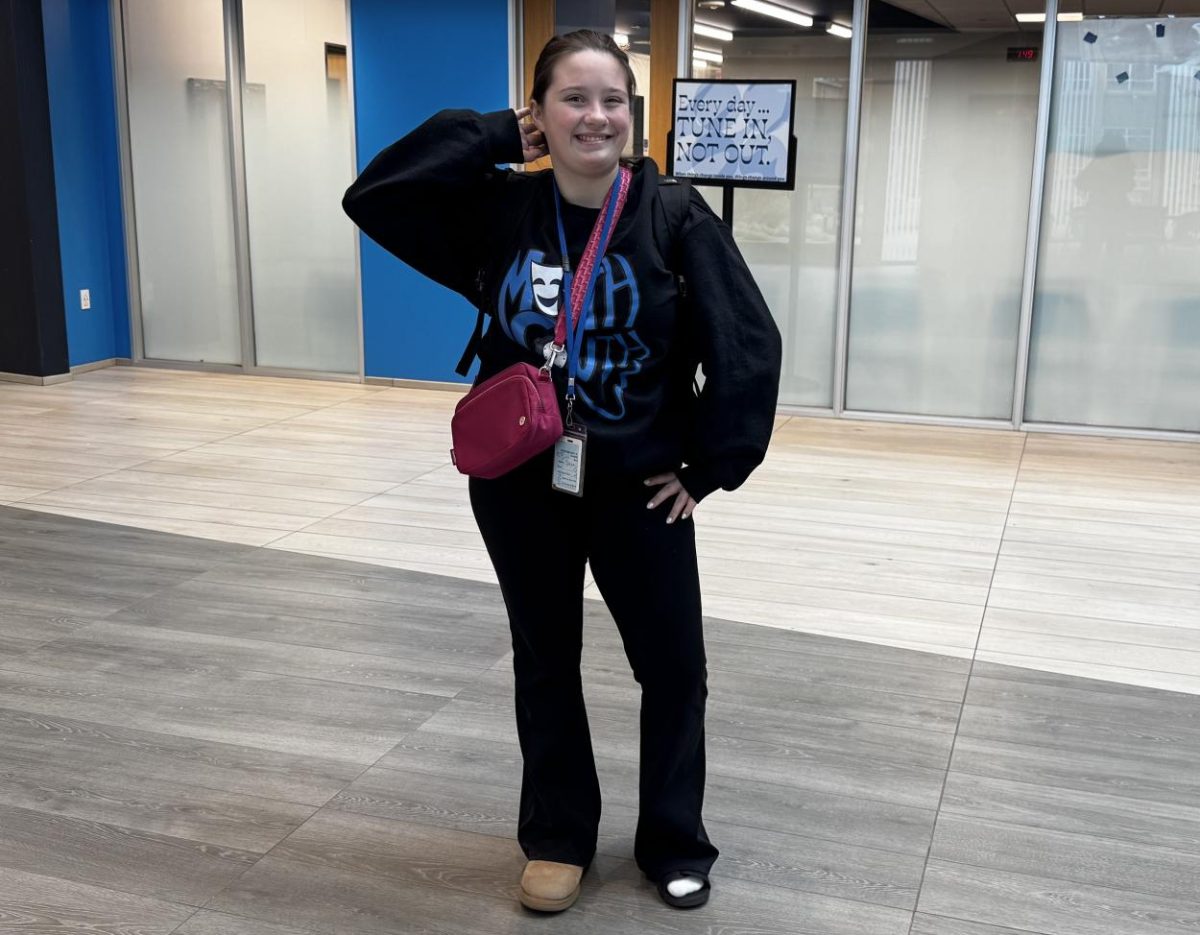 Freshman Kostera poses in the commons, fully expressing  her unique personality.