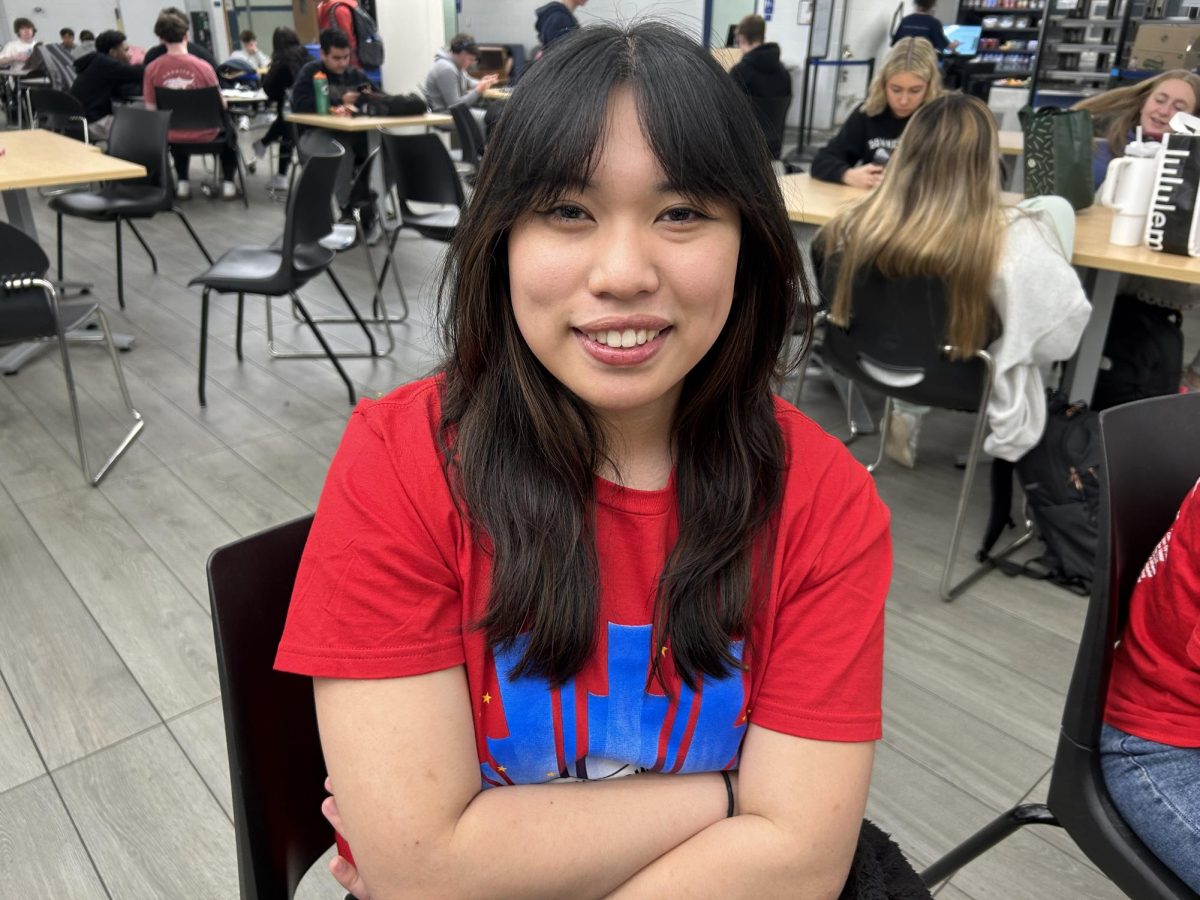 Senior Elysa Alikpala poses in the commons during her study hall