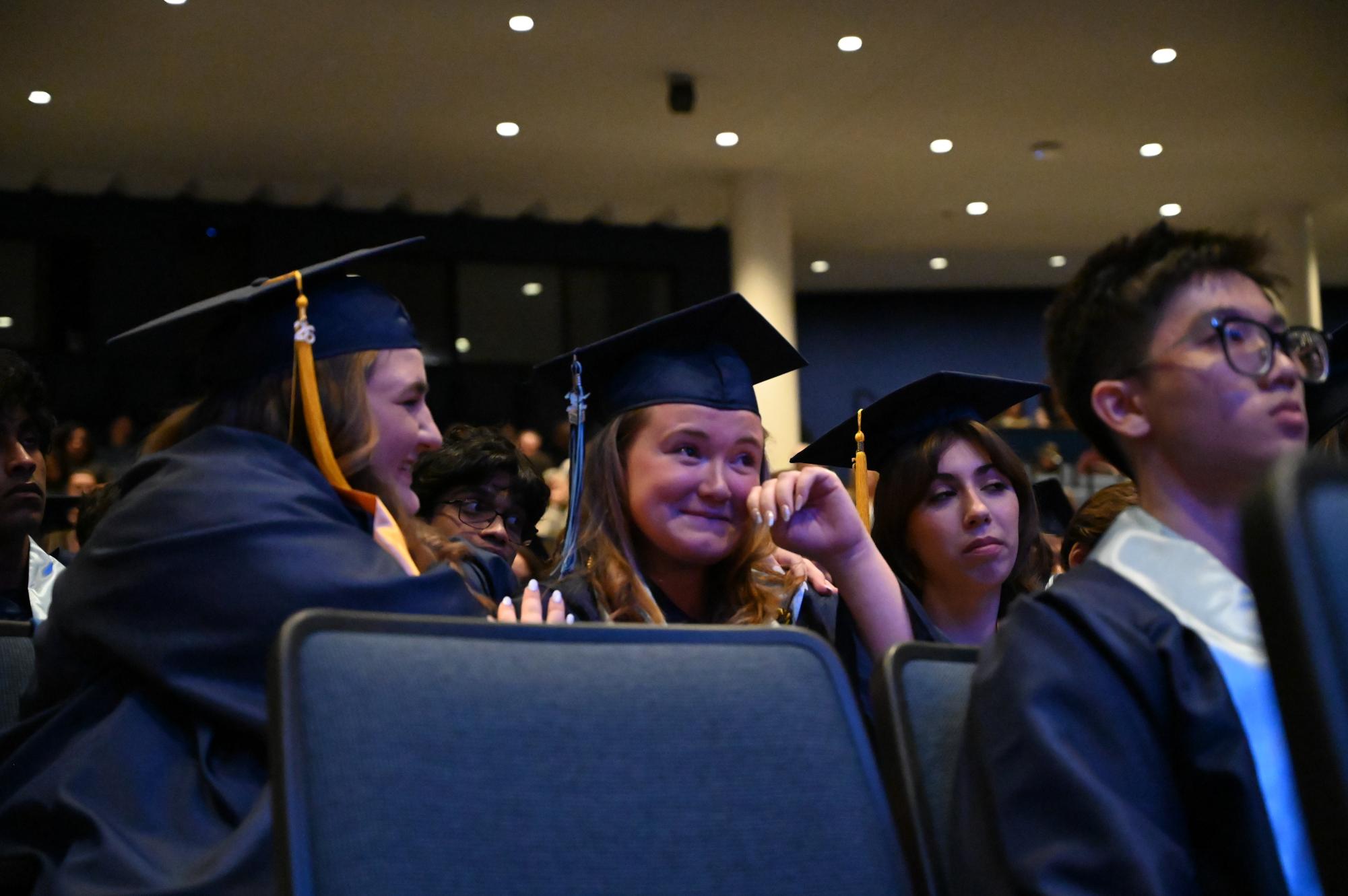 Senior Jenna Malon is supported by her friends as she is recognized for her achievements. 