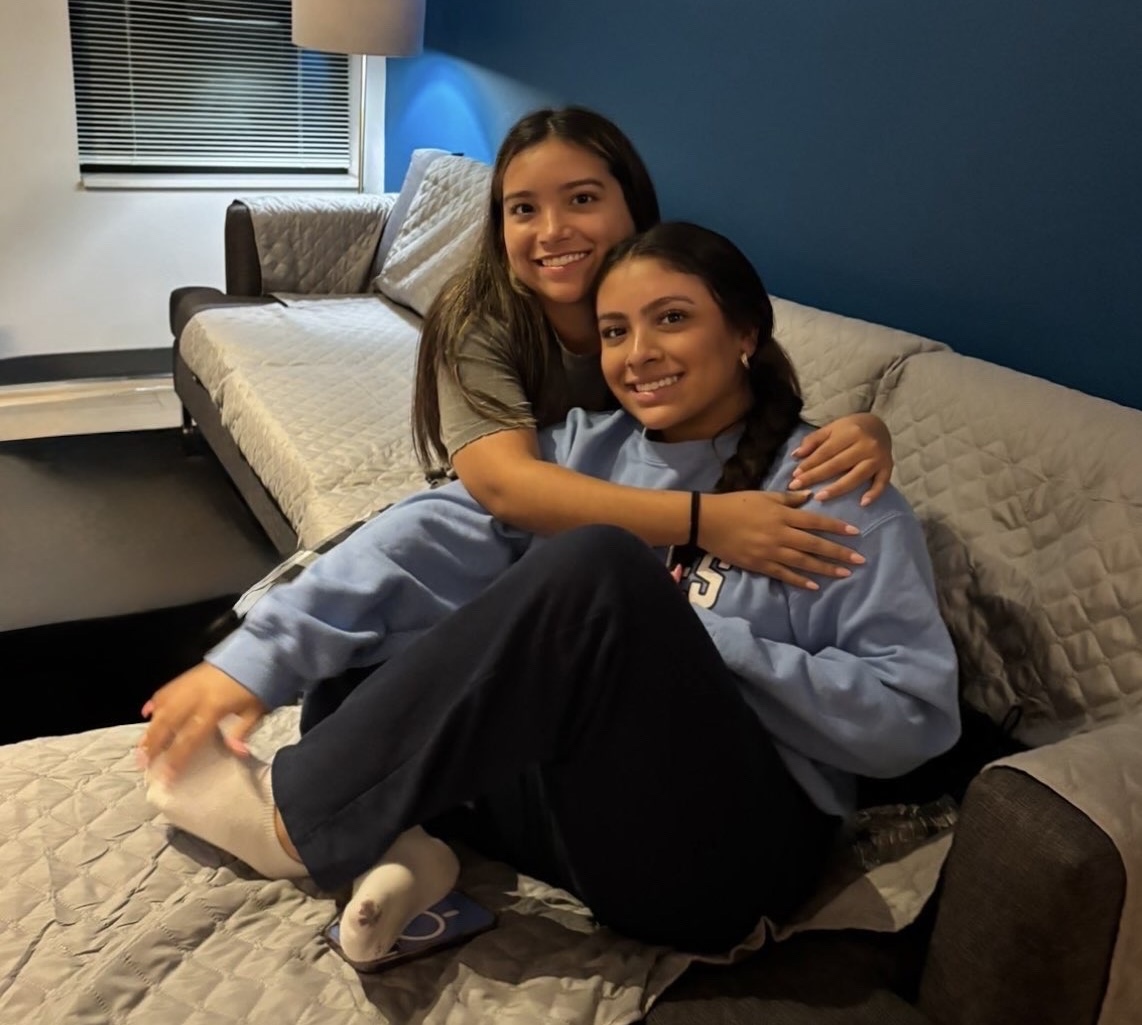 Junior Isabella Monreal savors the moments with her sister before she left for college.