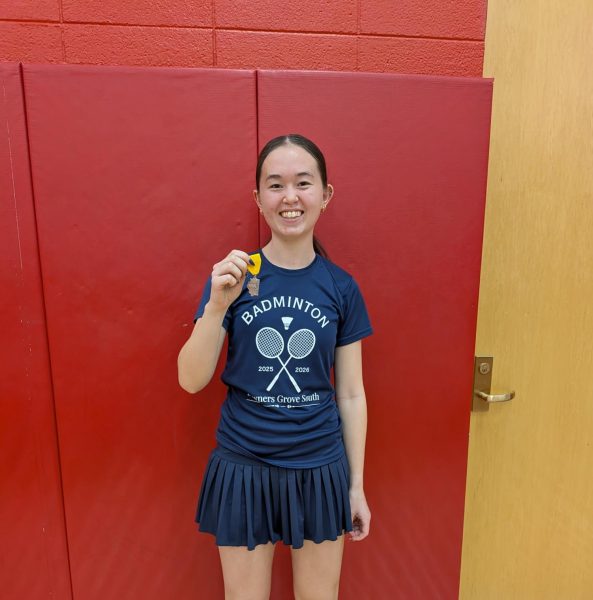 Samantha Stapleton celebrates after placing fourth in sectionals and qualifying for state.